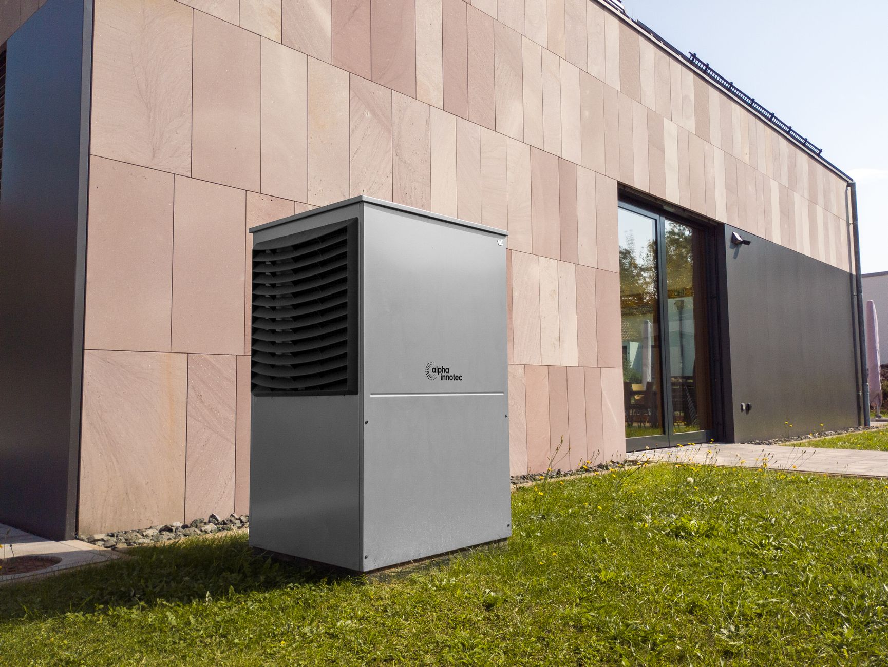 Pool heater unit installed beside a residential pool