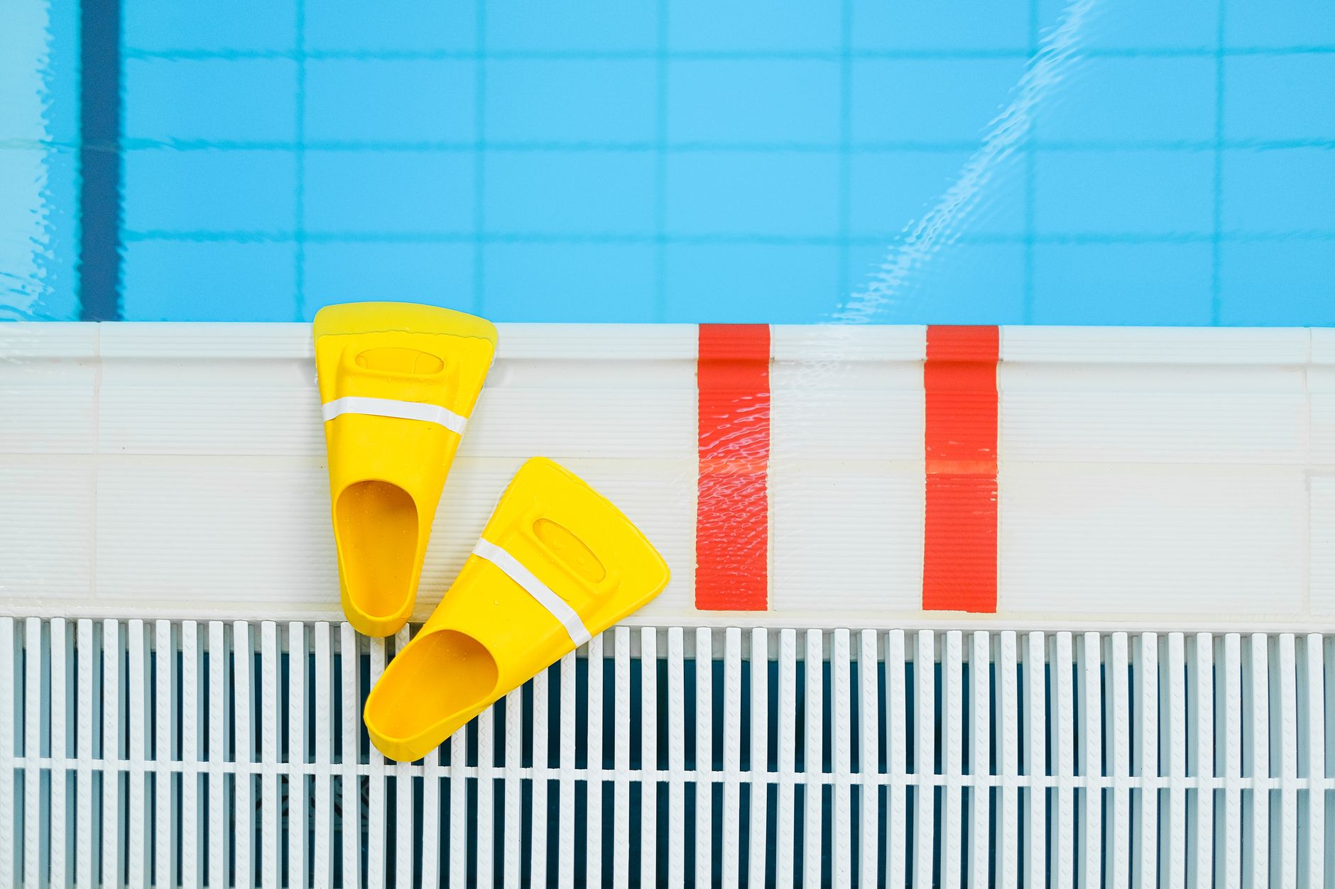 Technician using equipment to detect a pool leak