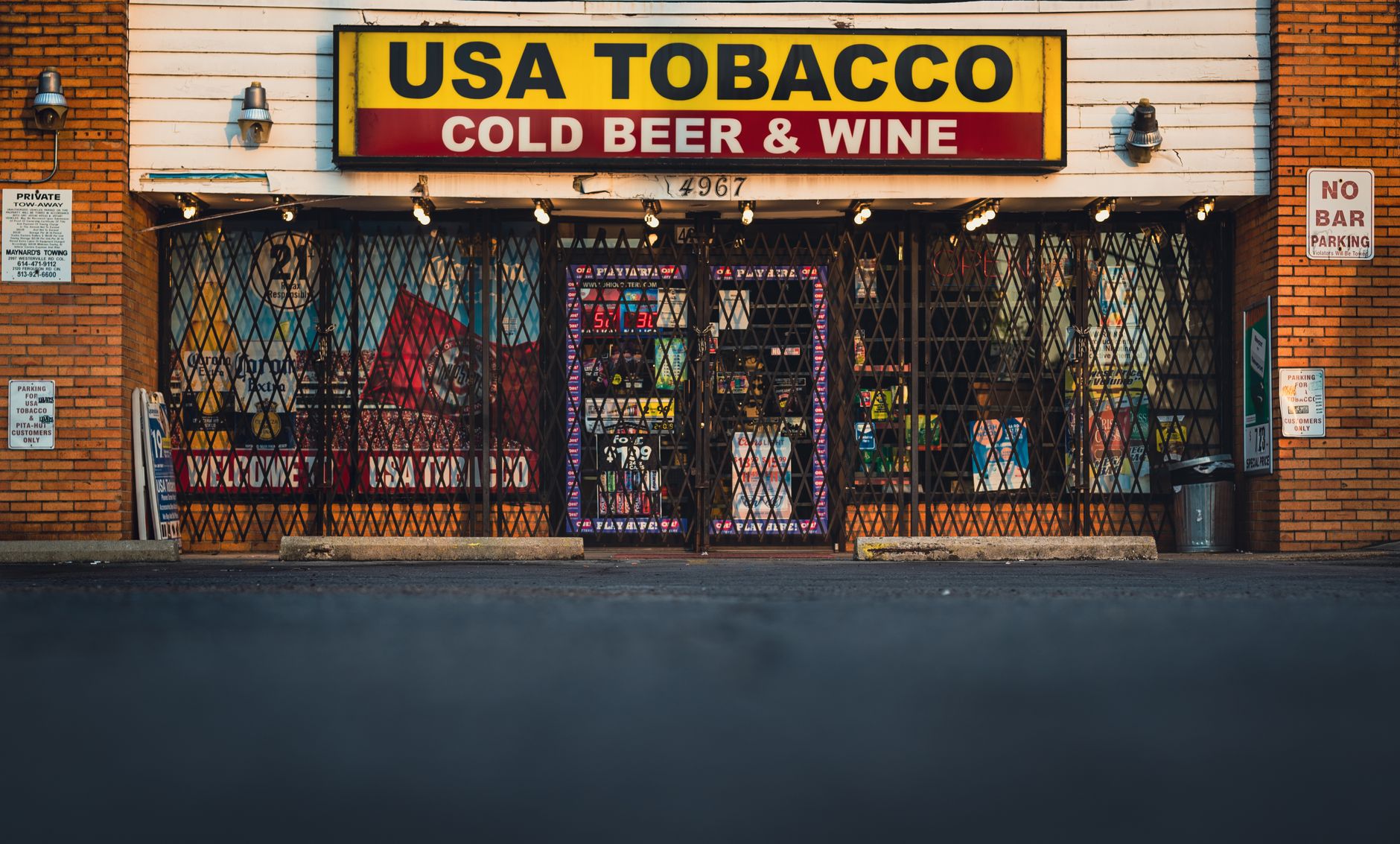 Exterior of a gritty Philadelphia bar at night