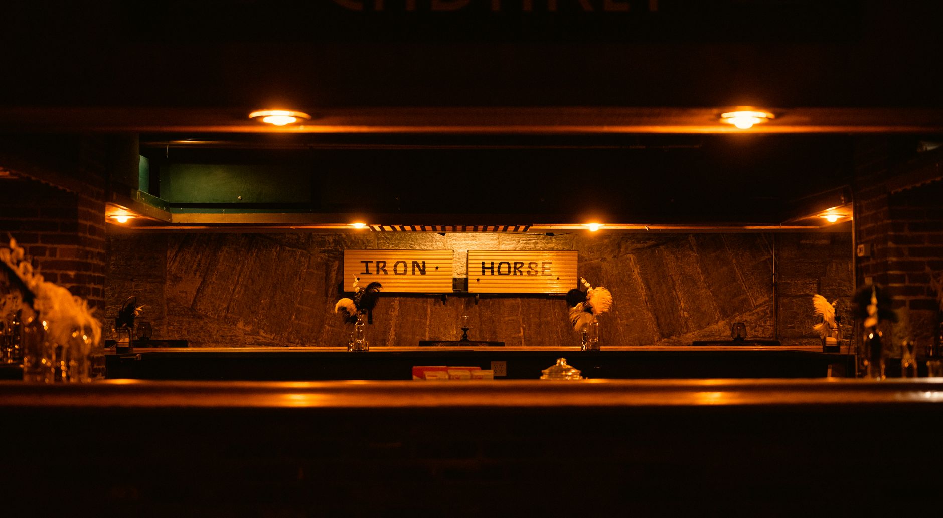Dimly lit Philadelphia dive bar interior